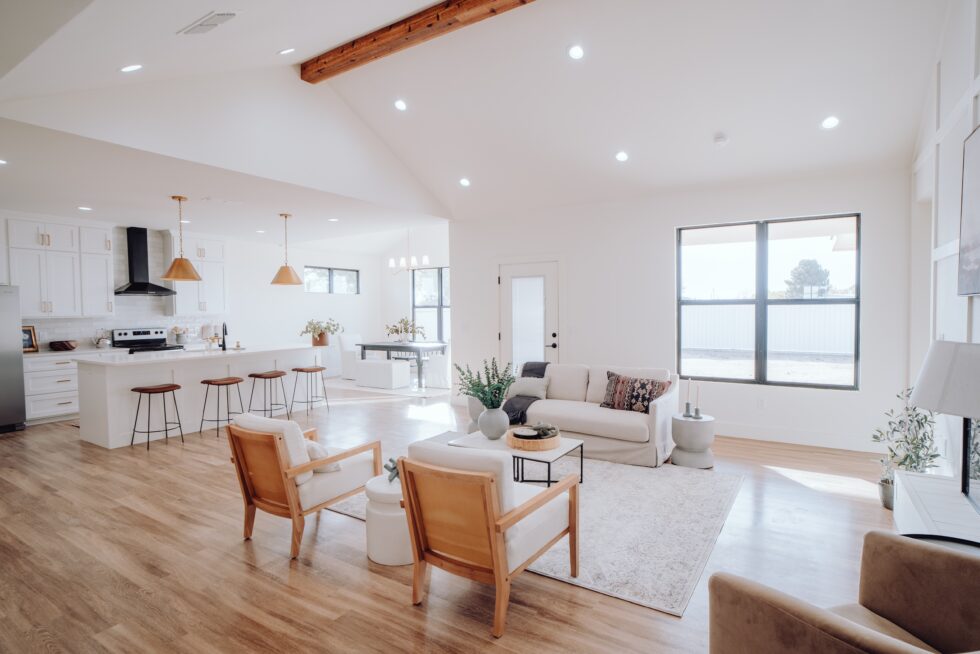 Large open kitchen with wood floors and a large island